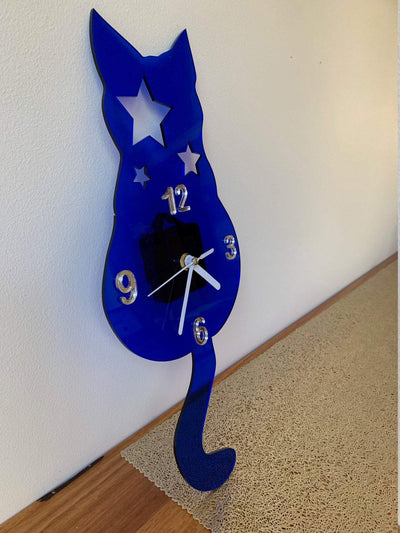 Wall clock with original design of a cat with stars blue silver numbers and white arms kids bedroom home decoration